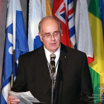 David Huestis - Chairman Canada Chapter - reading out the citations for the new Youth BP Fellows.