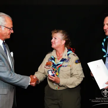 Mrs Cynthia Collins (US) presented to His Majesty as new B-P Fellow.