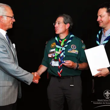 Dr Brad Epstein (US) presented to His Majesty as new B-P Fellow.