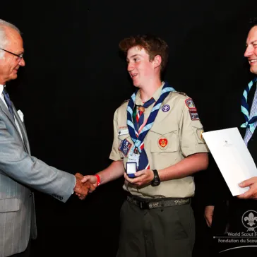 Mr Carl Hogsten III (US) presented to His Majesty as new B-P Fellow.