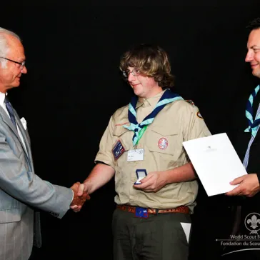 Mr Eric Horne (US) presented to His Majesty as new B-P Fellow.