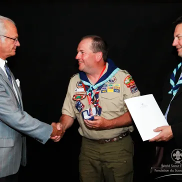 Mr Mark Lovil (US) presented to His Majesty as new B-P Fellow.