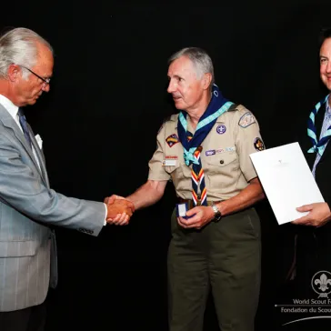 Mr Dennis Waitzmann (US) presented to His Majesty as new B-P Fellow.