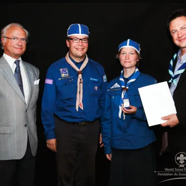 Suomen Partiolaiset - Finlands Scouter represented by Henrik Söderman and Heidi Jokinen - presented as a new B-P Fellow.