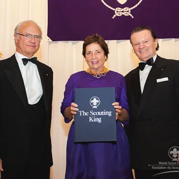 Mrs Margot Bogert (US) - Regal Circle Member - receives a signed copy of the anniversary book