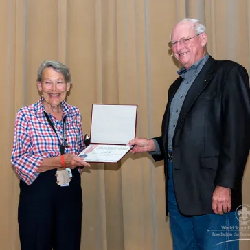 Mrs Gill Clay presented with the BSA Silver World Award by Mr Roger Schrimp